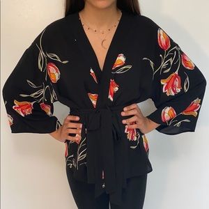 Black and floral belted blouse